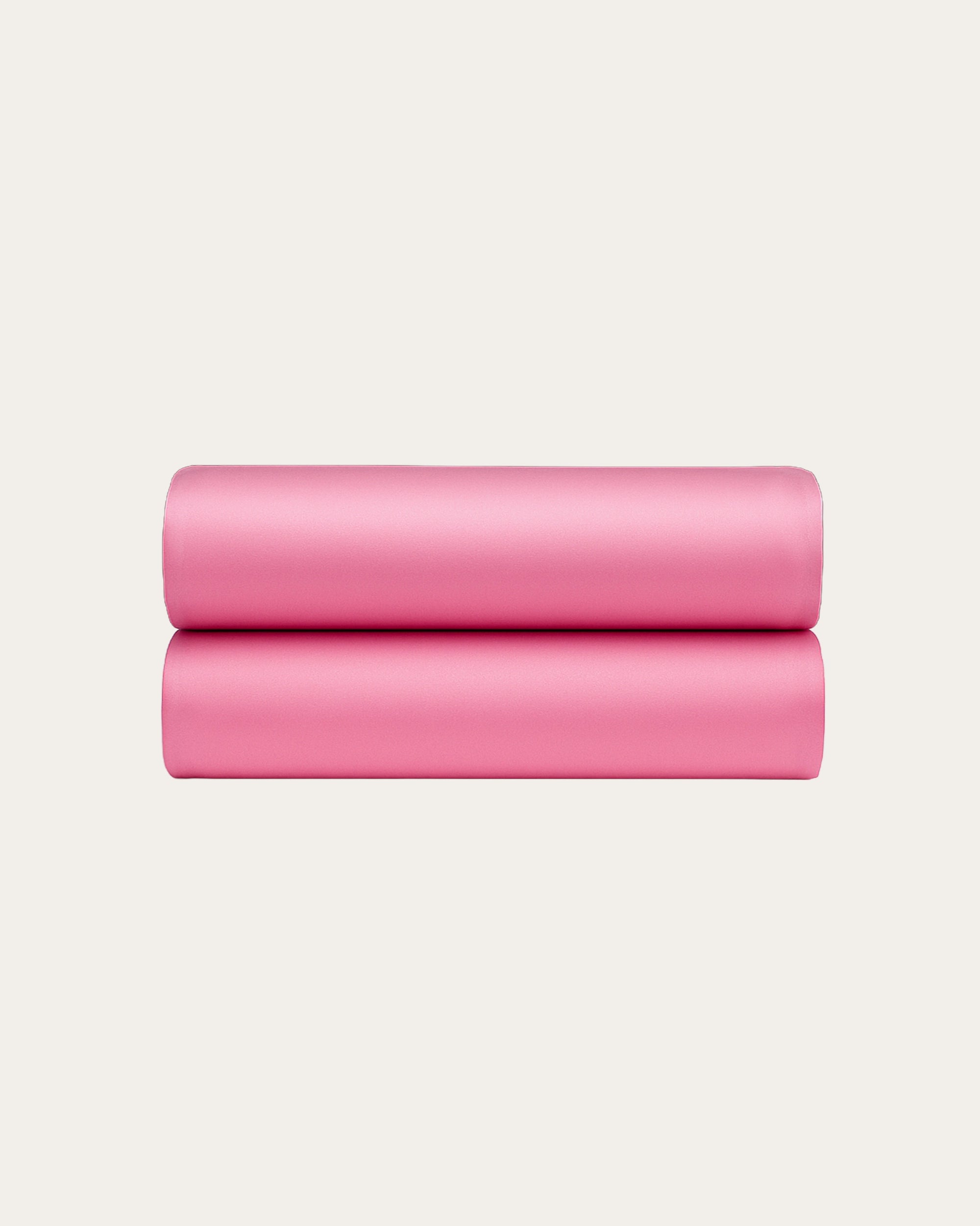 Luxurious Blossom Pink satin fitted sheet offering silky softness and elegant bedroom comfort.