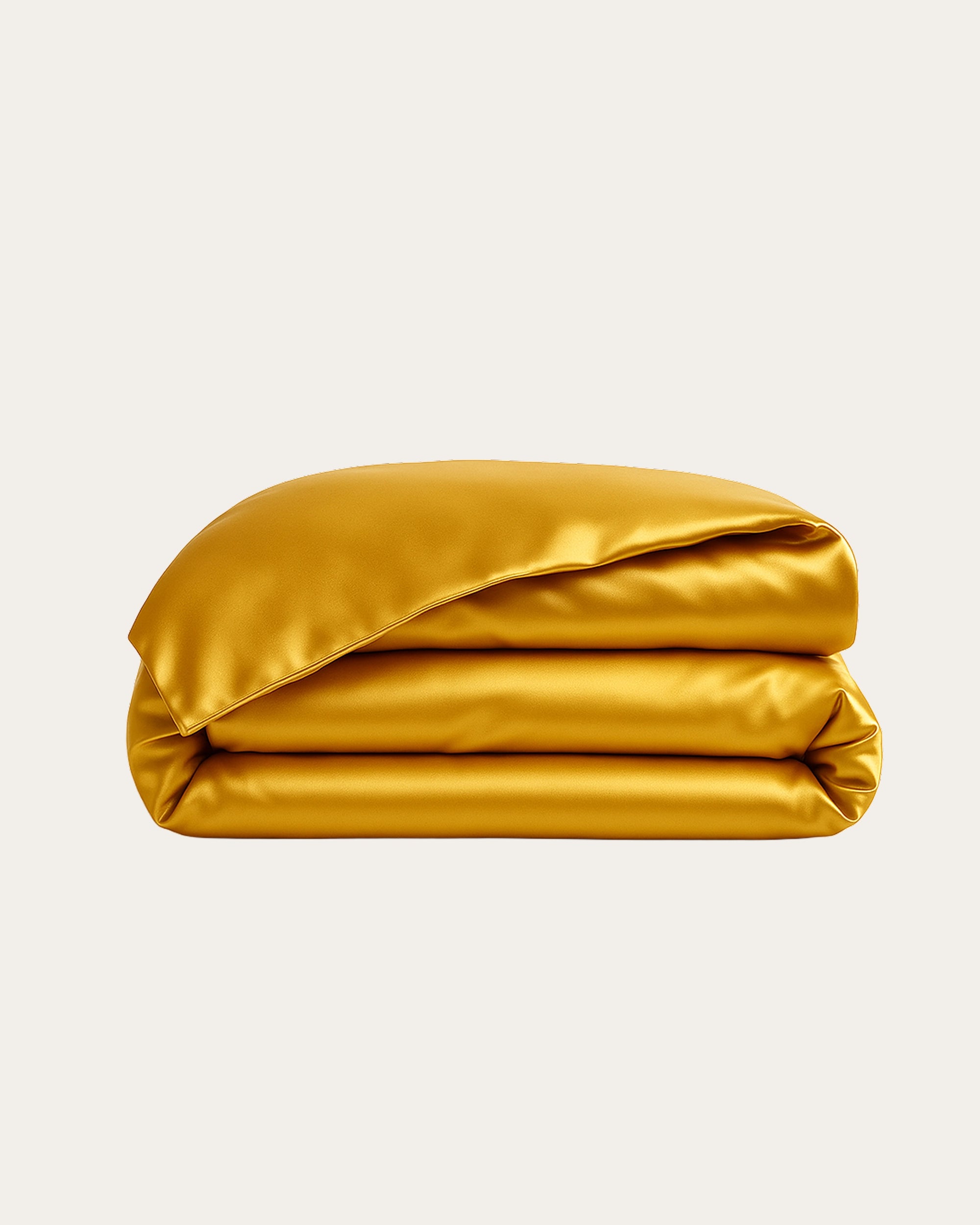 Royal Gold Satin Duvet Cover stacked showcasing its rich hue and luxurious silky texture for a glamorous bedroom.