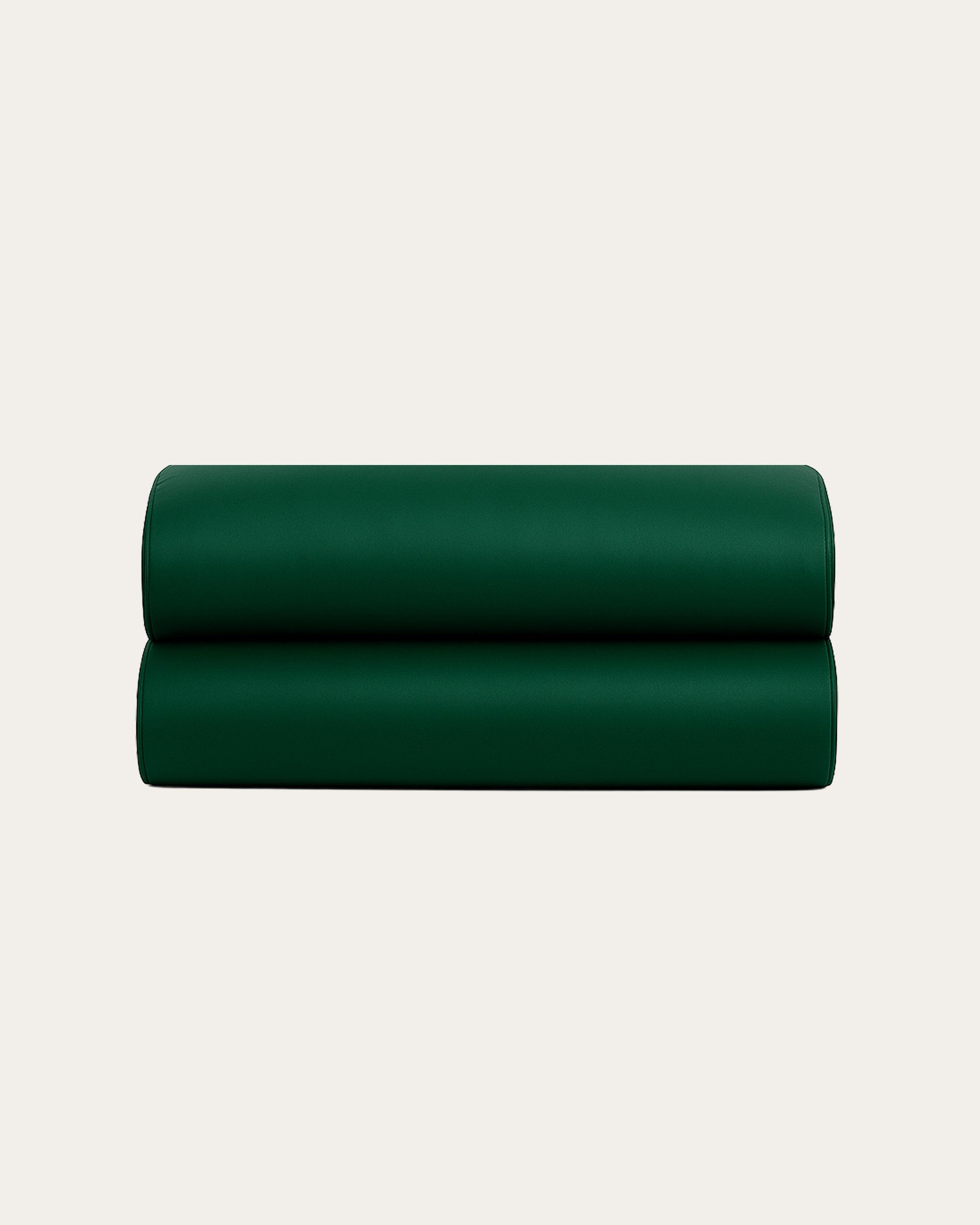 Luxurious Green satin fitted sheet offering silky softness and elegant bedroom comfort.