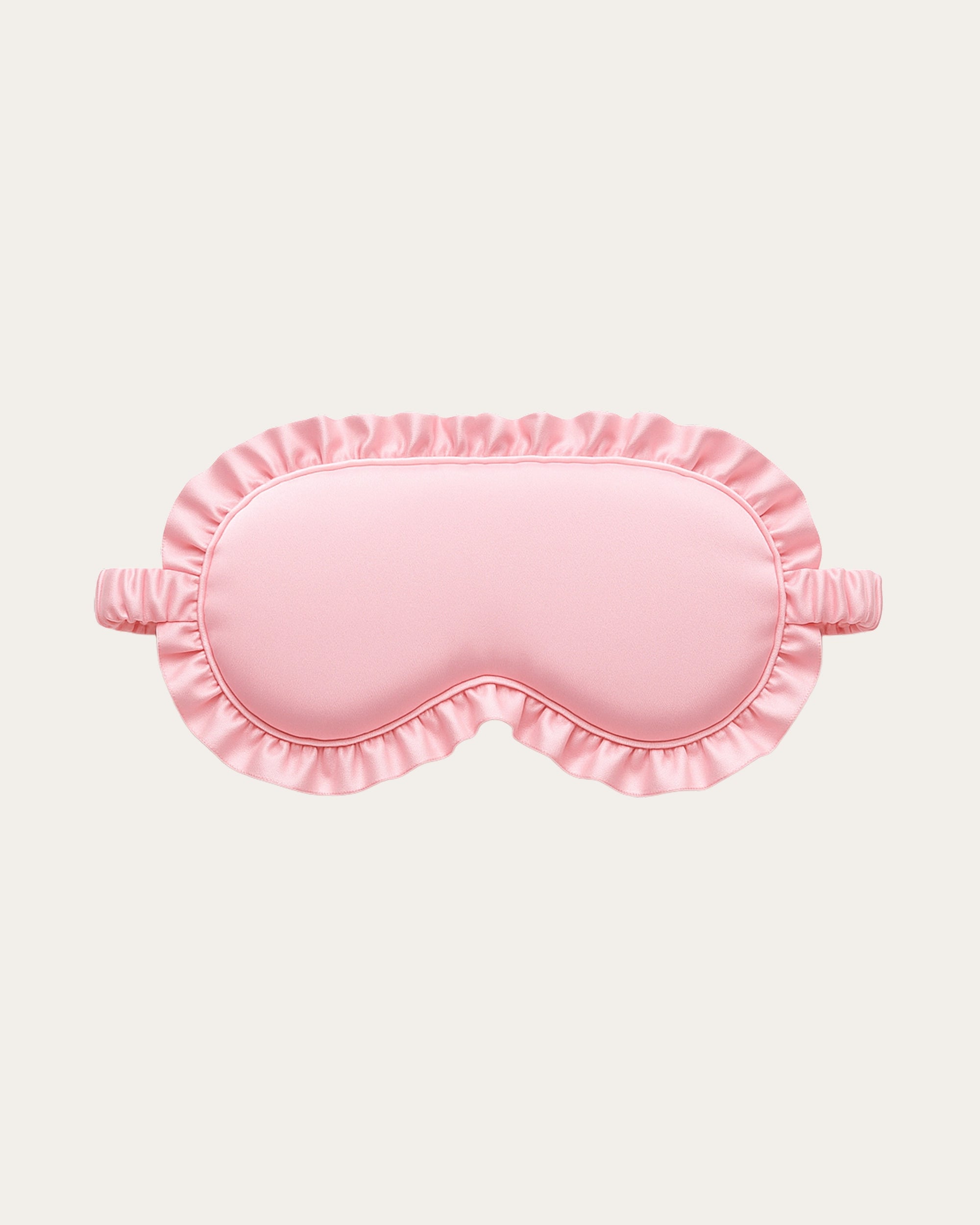 Satin ruffled sleep mask designed for luxurious comfort, offering a silky smooth feel and an elegant ruffle detail for restful nights.