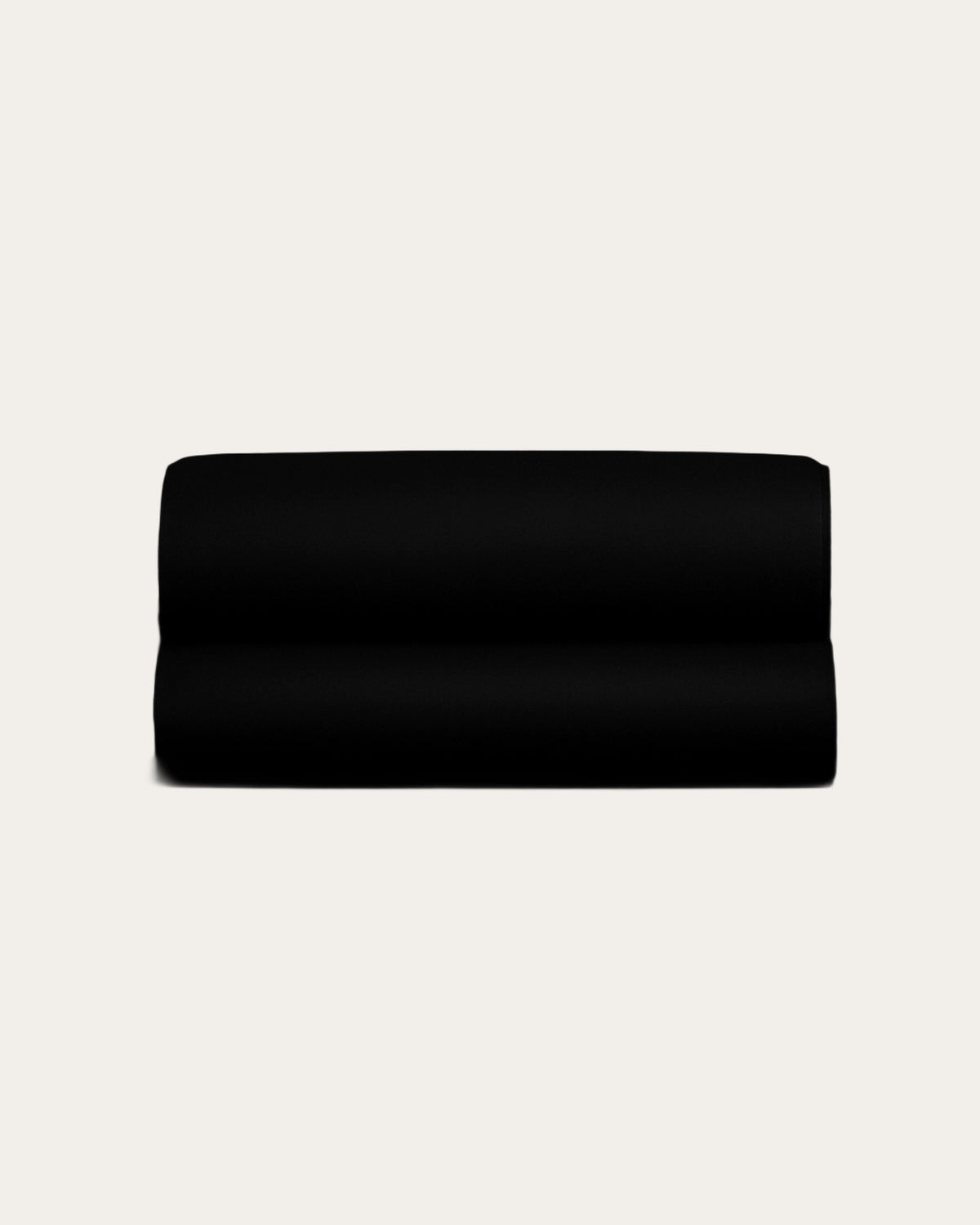 Black velour satin fitted sheet showcasing sleek, modern design and luxurious comfort for elegant bedrooms.