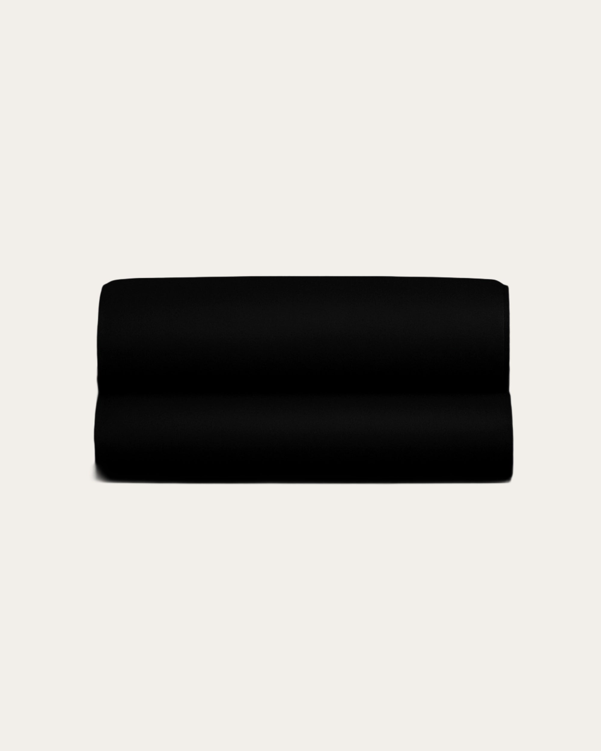 Black velour satin fitted sheet showcasing sleek, modern design and luxurious comfort for elegant bedrooms.